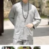 Pháp Phục Man wearing light gray traditional Chinese tunic with mandarin collar and black bead necklace outdoors neutral expression