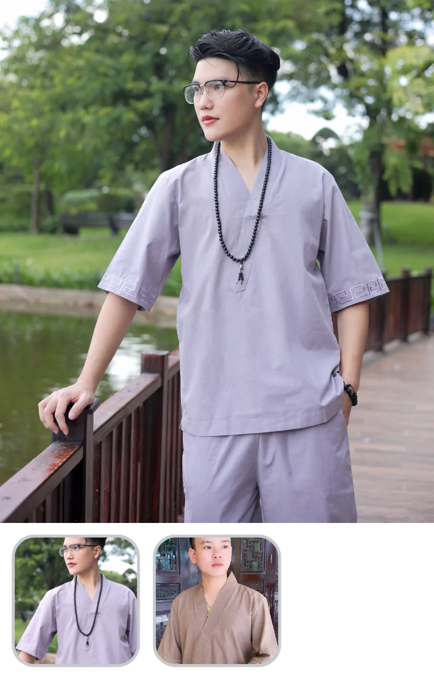 phap-phuc-tay-ngan Portrait of a person in a lavender traditional tunic with a black bead necklace, standing by a railing beside a pond in a park.