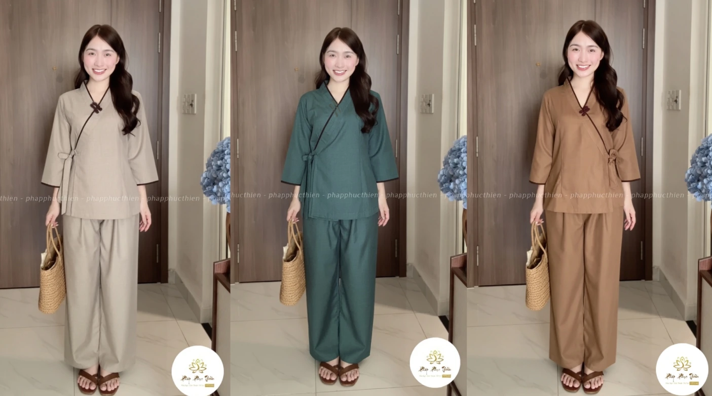 mau-sac-mau-phap-phuc-nhat 1 - Pháp Phục Thiền Pháp Phục Woman modeling a beige wrap top with matching wide leg pants holding a straw bag in a doorway at home