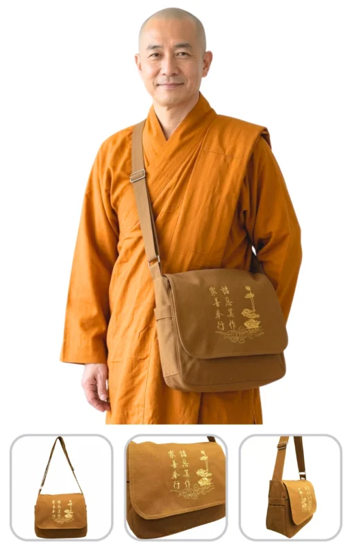 tui-cao-cap-nha-su-mau-vang - Pháp Phục Thiền Pháp Phục Buddhist monk in orange robes wearing a brown crossbody bag with gold Chinese embroidery on the flap