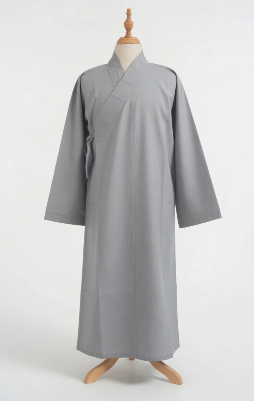 Long gray traditional wrap robe on a dress form, with crossed collar and tied sash at the side.