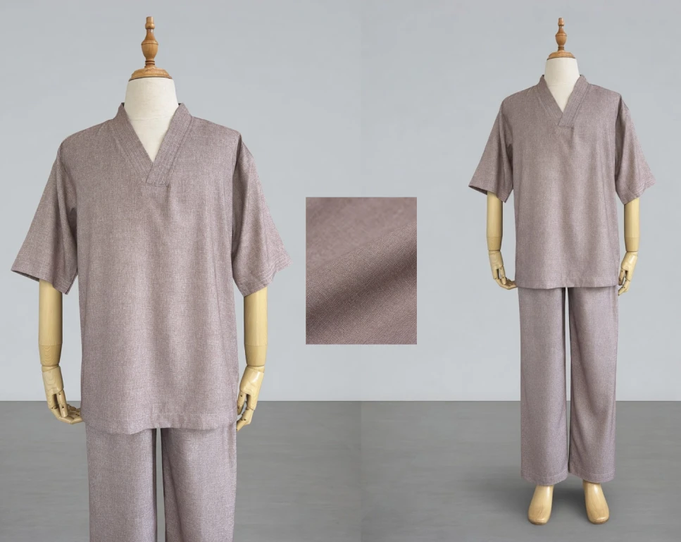 phap-chi-tiet-phap-phuc-thien-co-v - Pháp Phục Thiền Pháp Phục Front and side views of a matching mauve loungewear set on mannequins consisting of a V neck short sleeve top and wide leg pants with a fabric swatch in the center