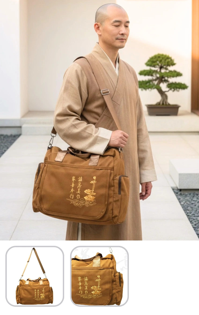 Buddhist monk wearing beige robes carries a brown shoulder bag with gold floral embroidery.