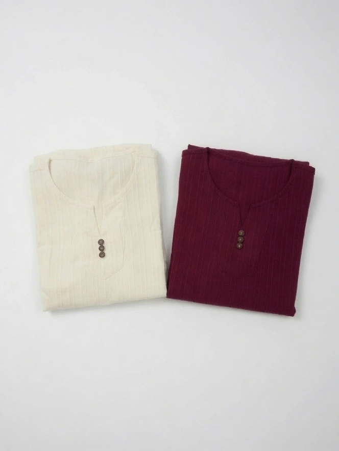 Pháp Phục Two folded henley style shirts cream and deep red with button plackets on a white background