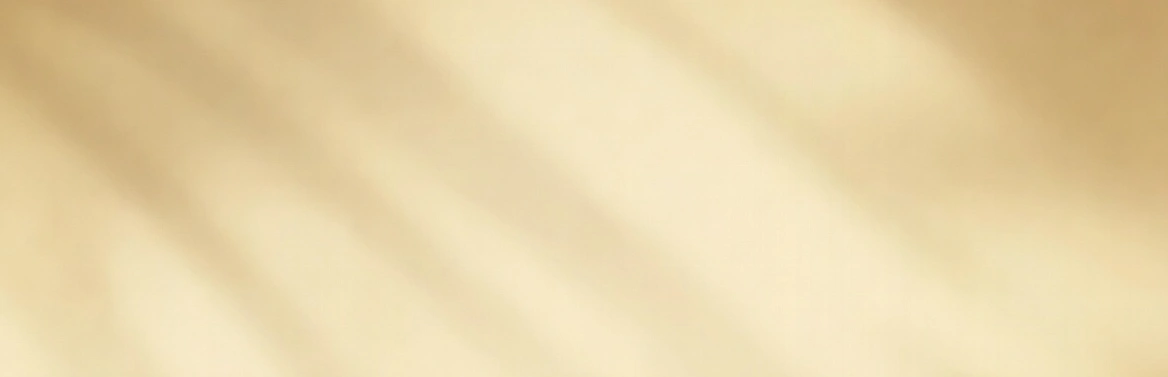 Pháp Phục Soft beige blurred background with warm diagonal light bands